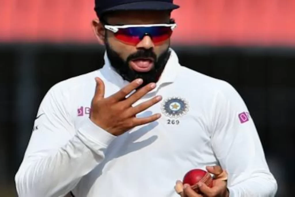 Indian cricketer in Test whites on the field