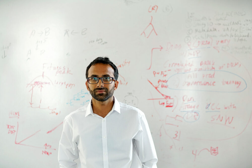 Dr. Ravindra Gupta, a virologist at University College London, in his office.