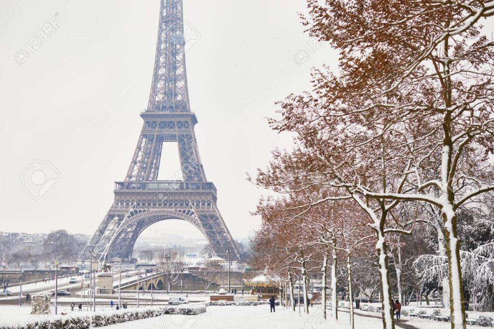Scenic view to the Eiffel tower on a day with heavy snow