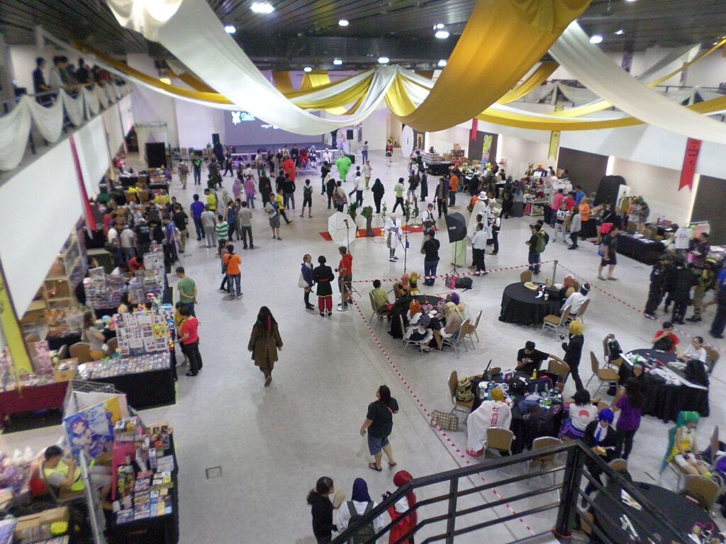 Fans in cosplay at an anime convention, where demon lord characters are popular costume choices