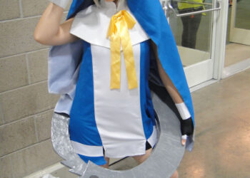 Cosplayers dressed as anime characters at a fan convention