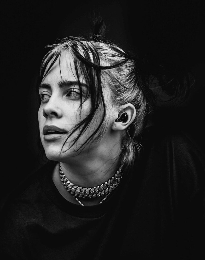 Billie Eilish performing on stage
