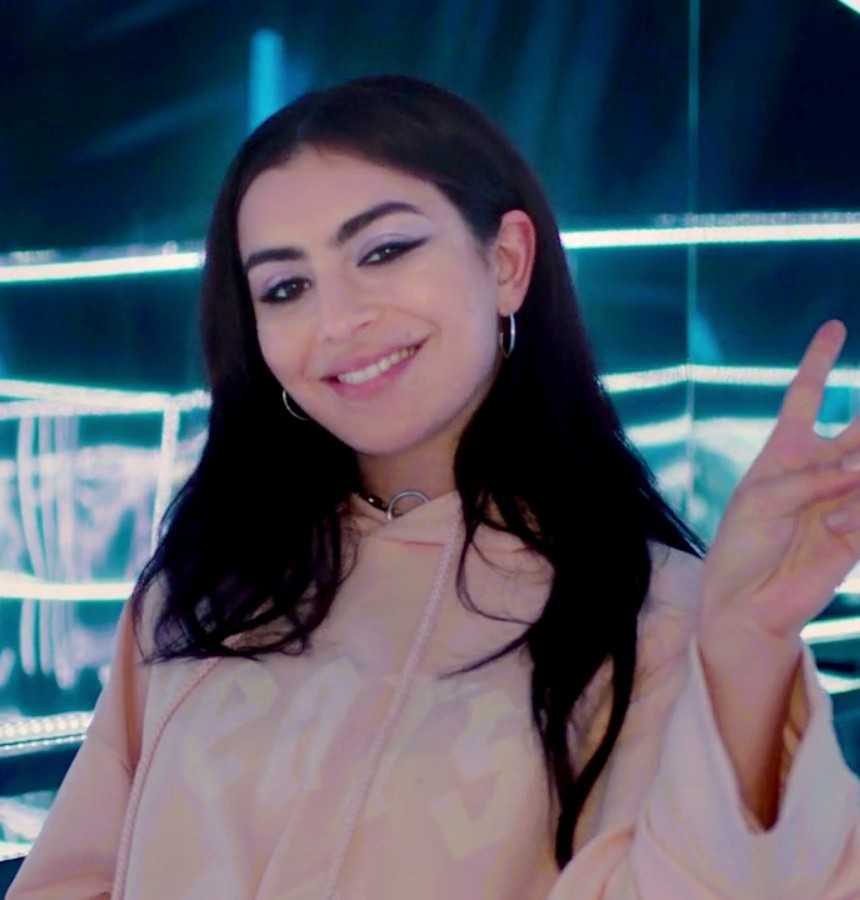 Charli XCX performing live on stage