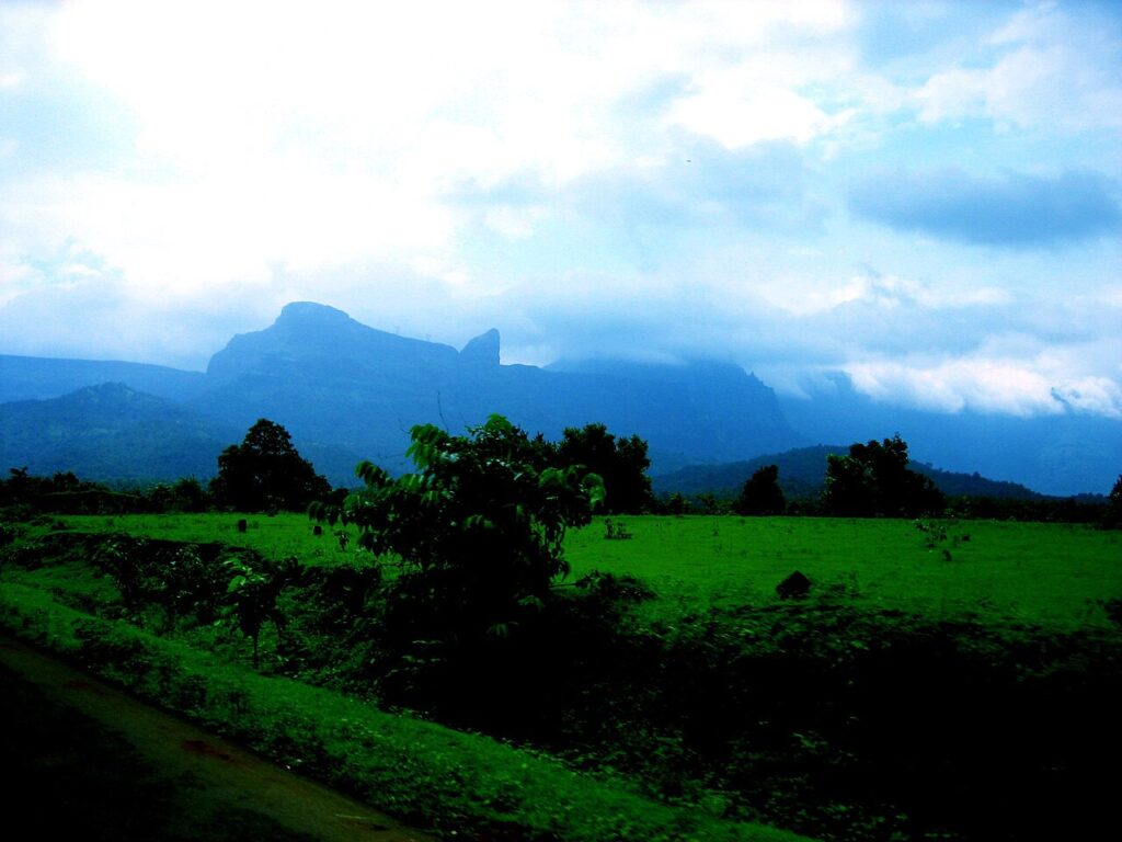 Green hills and waterfalls at Malshej Ghat, a monsoon road trip from Mumbai