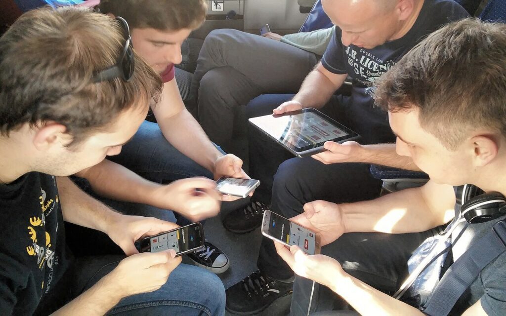 A player gaming on a smartphone, the format behind PUBG Mobile and BGMI streams in India