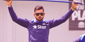 Virat Kohli in sunglasses during an India training session