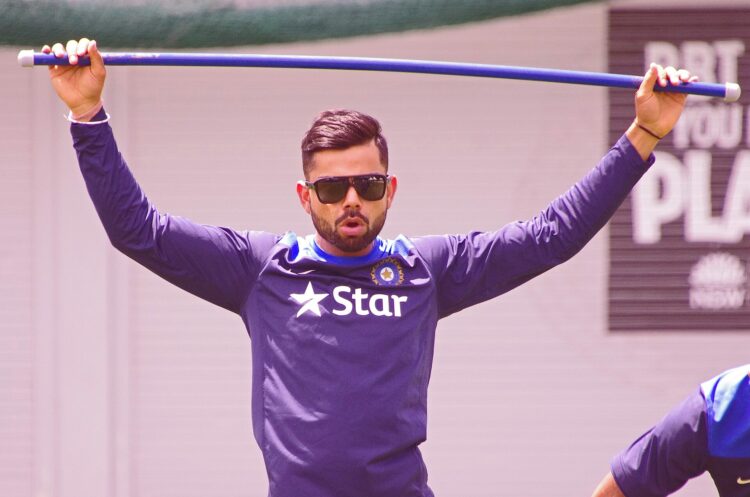 Virat Kohli in sunglasses during an India training session